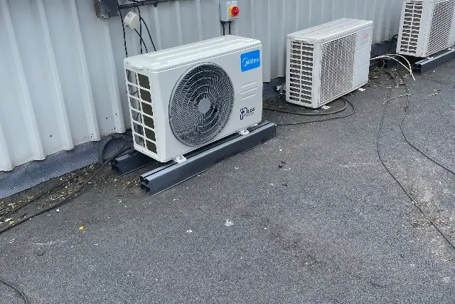 Air conditioning maintenance for Teesside businesses Outdoor air conditioning units on a commercial flat roof