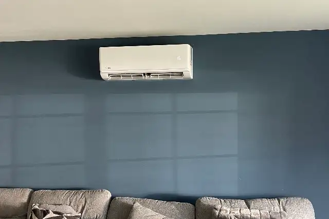 Domestic air conditioning in Teesside Domestic air conditioning unit installed above the sofa in a family living room