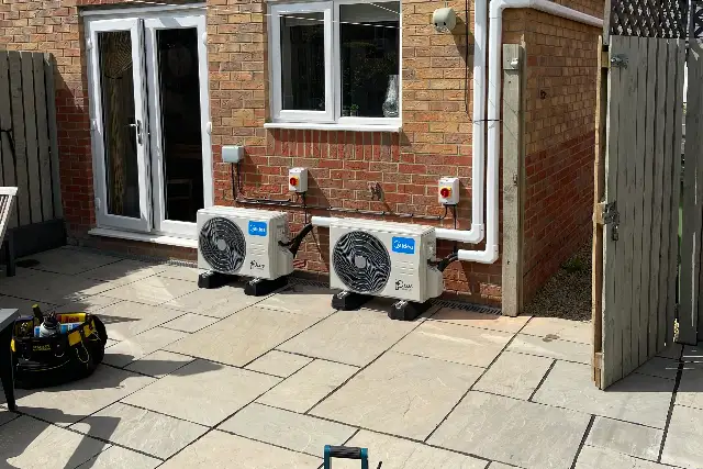 Multi-split air conditioning in Teesside Two outdoor air conditioning units serving several rooms, installed on a rear patio